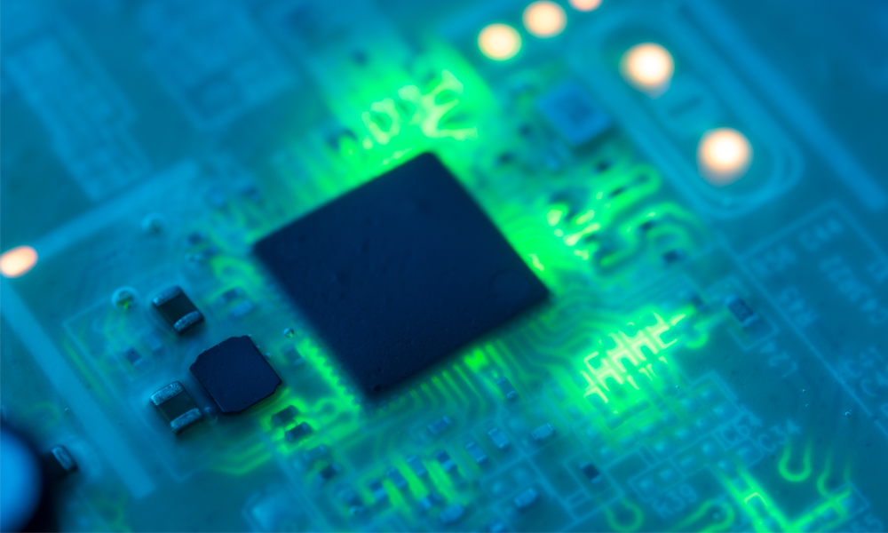 Scientist holding a microchip